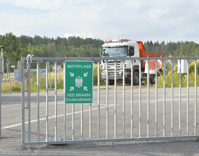 Møteplass ved brann - evakuering skilt